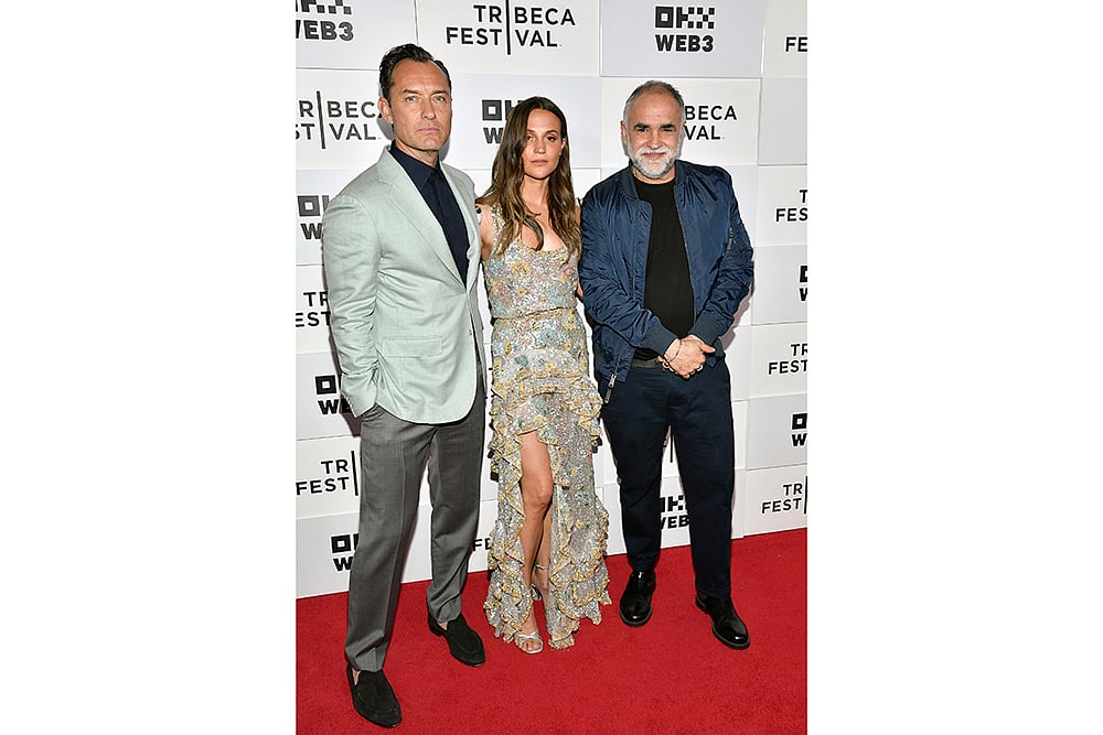 Jude Law, left, Alicia Vikander And Karim Ainoz